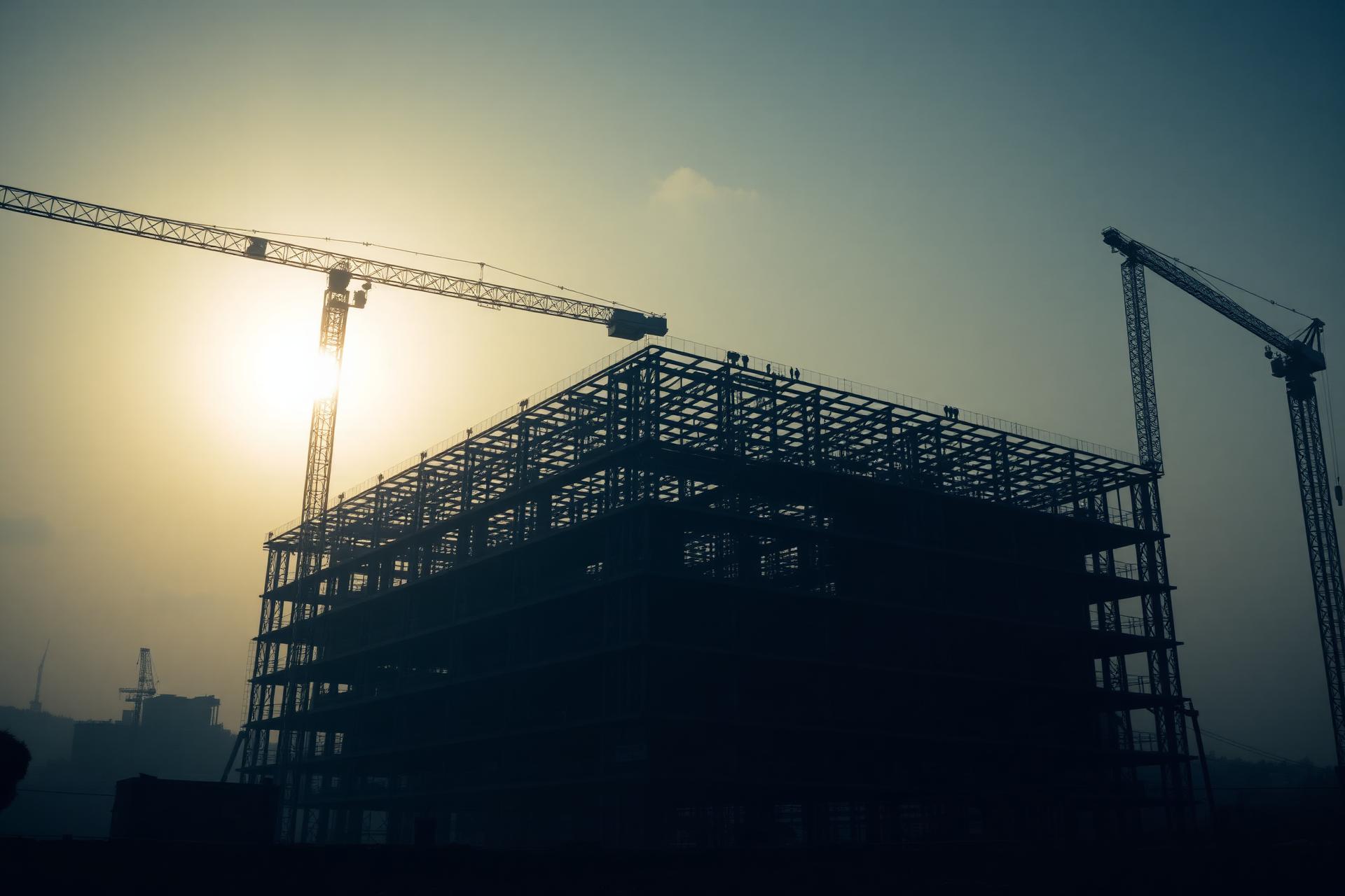 Major building construction site with tower cranes